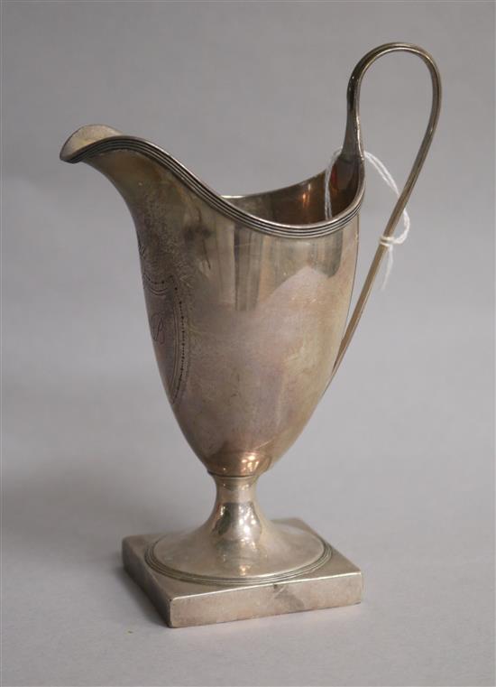 A George III silver helmet shaped cream jug, Peter & Ann Bateman? London, 1791, 15.9cm.